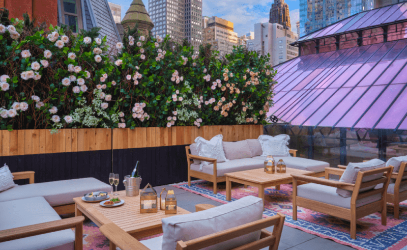 Sitting area on the rooftop of The Beekman Hotel